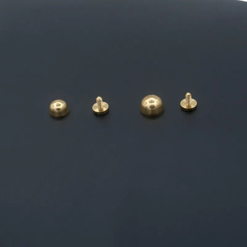 Brass decorative buckles showing 10mm and 12mm sizes with geometric and round foot nail designs