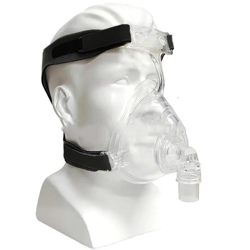 CPAP breathing mask with transparent silicone cushion and polycarbonate frame with ventilator adapter elbows