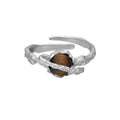 Women's adjustable Saturn open ring in white gold colour on silver.