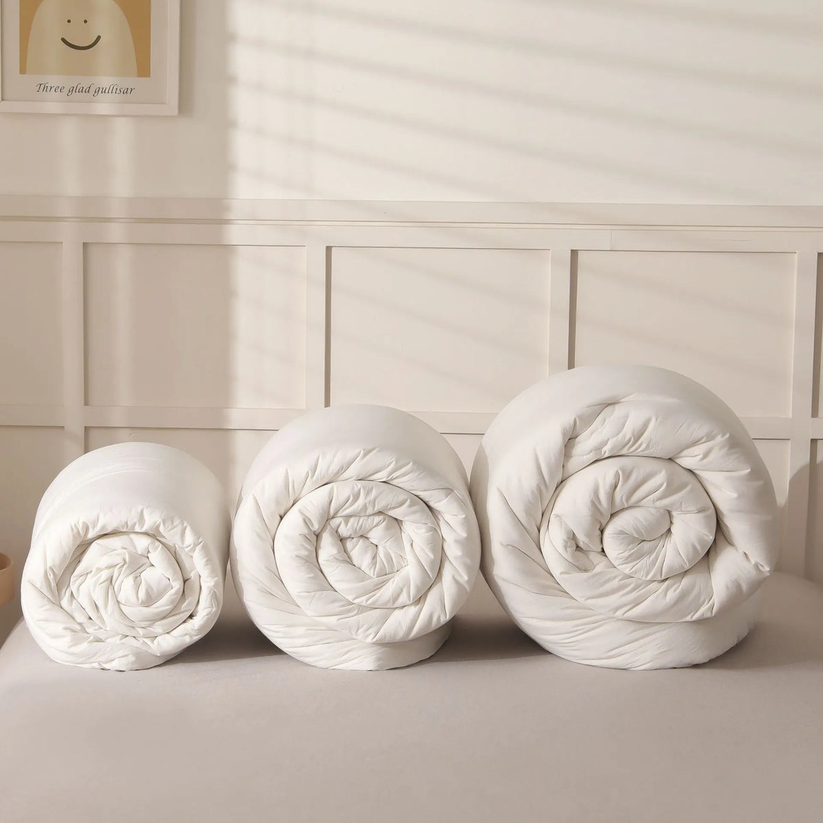 Soybean fibre filled quilt with pure cotton twill cover shown in grey, pink jade, and white colour options.