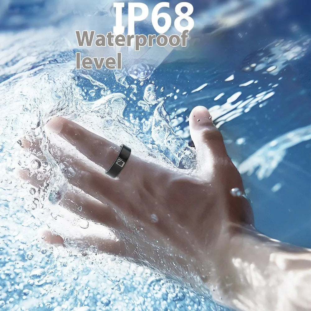 Black ceramic smart ring for health tracking on a finger, showing heart rate and SpO2 monitoring.