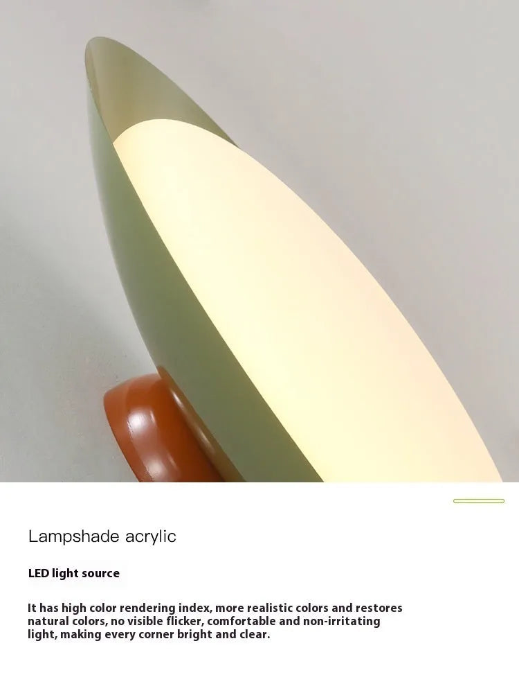 Modern cream style flying saucer ceiling lamp in mint green colour showing iron construction