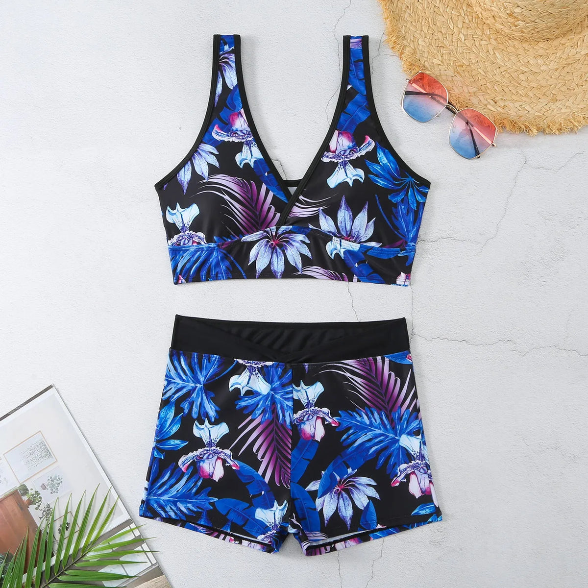 Women's two-piece swimsuit with sleeveless top and printed boxer briefs in multiple colour options.