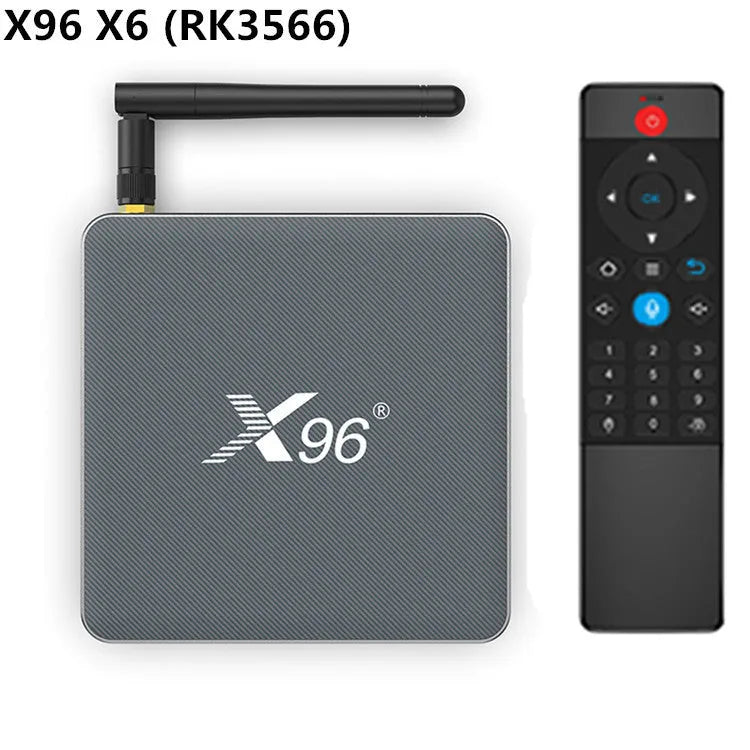 Smart Voice Set-top Box with remote, HDMI cable, and power adapter on a table.