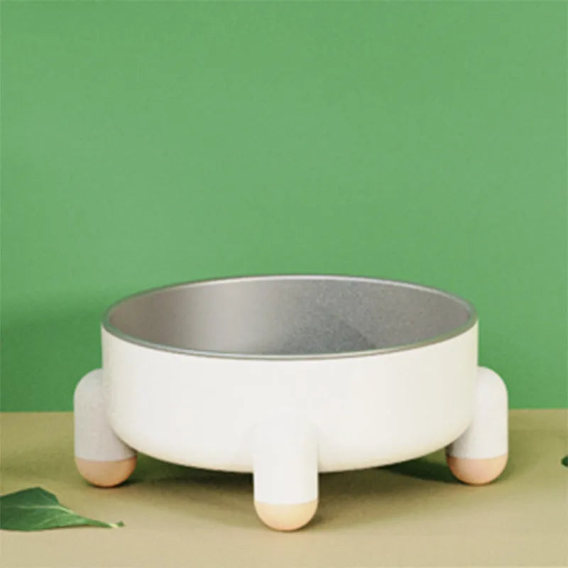 Green stainless steel non-slip pet bowl with anti-overturn high foot design for dogs and cats.