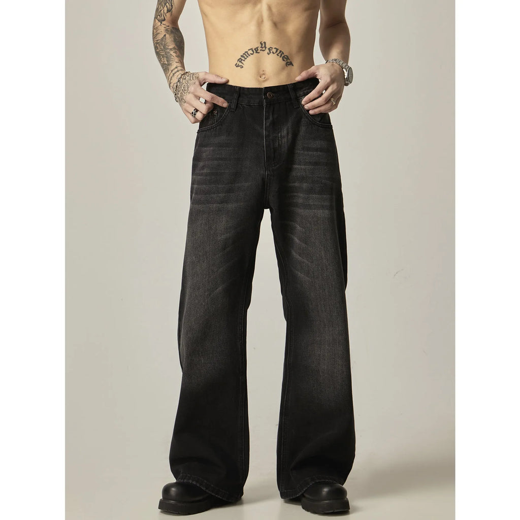 Black loose-fit straight-leg jeans with a zip fly in an American retro style.