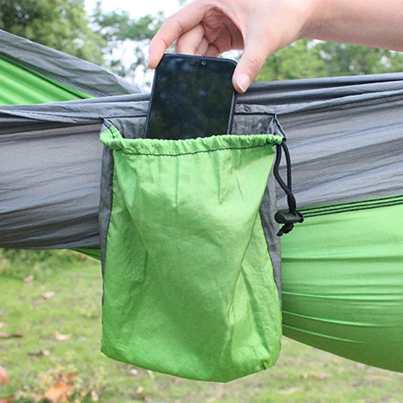 Blue nylon parachute cloth hammock 270x140cm suspended outdoors for camping