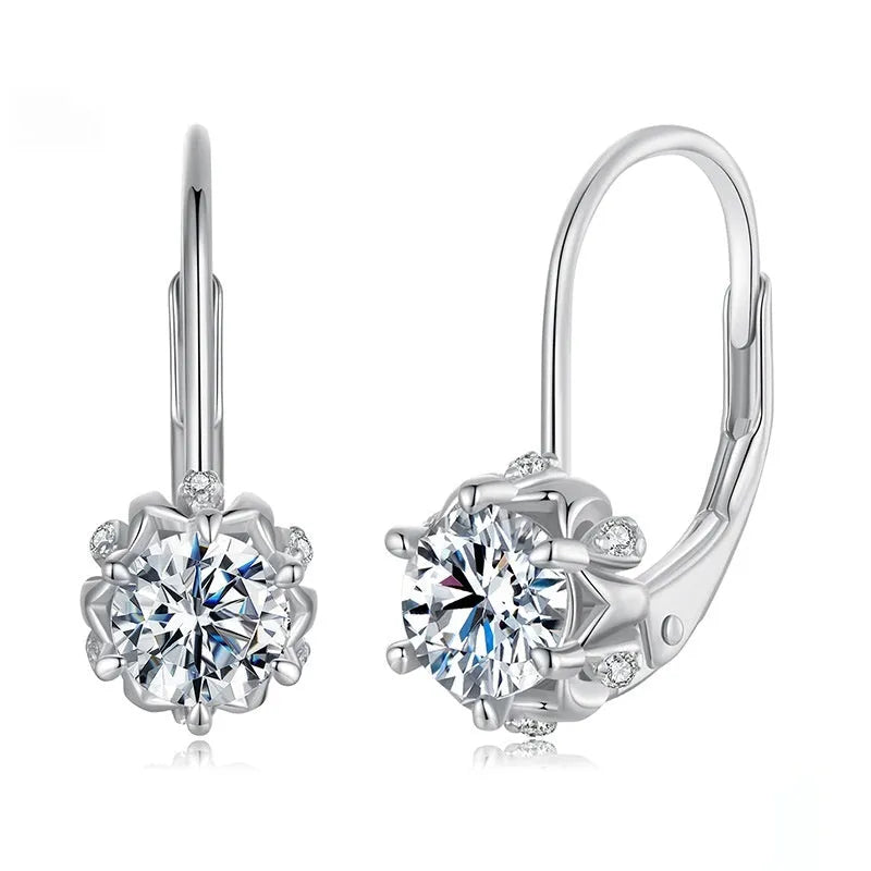 Sterling silver flower bud clip earrings with moissanite stone and white gold plating.
