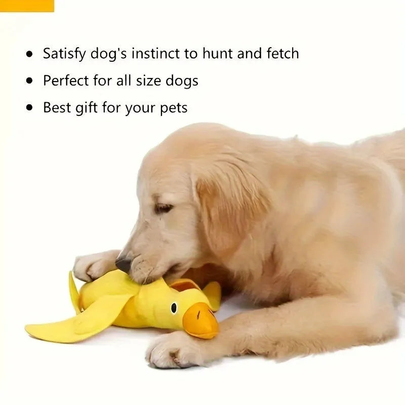 Yellow plush duck dog toy with squeaker and food leak compartment for treats.