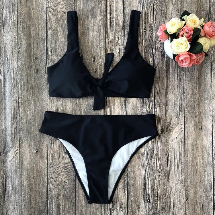 Women's solid colour polyester bikini swimsuit set in black, pink, red, white, or wine red.