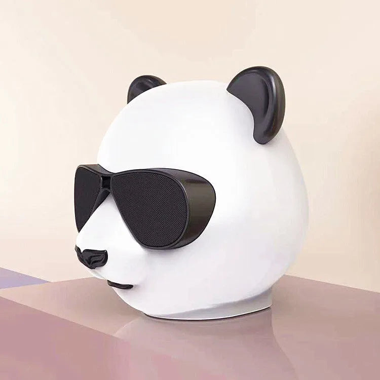 Portable mini Bluetooth speaker with classic styling showing USB port and wireless connectivity