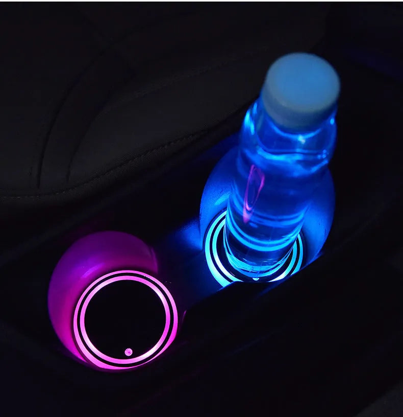 Colourful LED light-up coaster for car cup holder showing seven light modes on a non-slip acrylic surface.