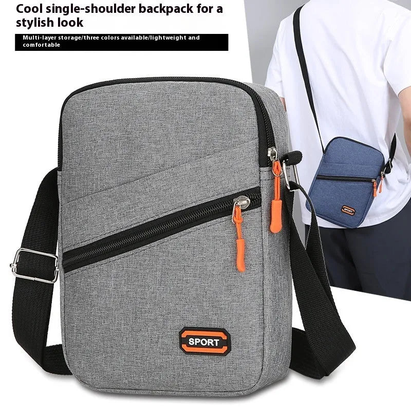 Ultra-light Oxford cloth commuter crossbody bag in solid colour with contrast trim