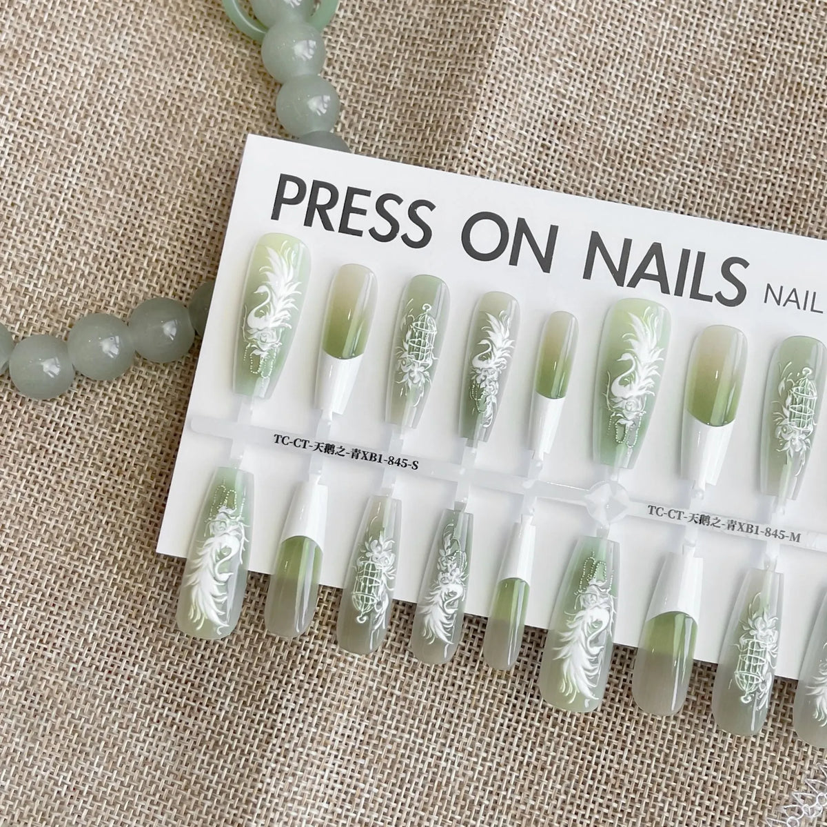 Antique swan relief embroidery press-on nail tips, 40pcs set in SMSXS, with matte or glossy finish options.