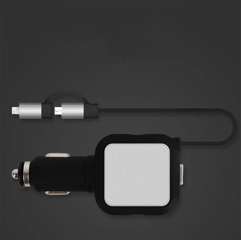Black and gold dual USB car charger with retractable cable shown plugged into car dashboard