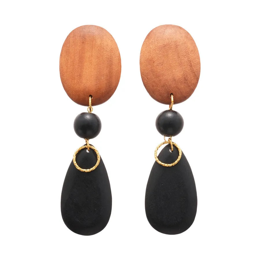 Hand-crafted wooden oval earrings in silver needle and brown-black retro style.