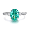 S925 silver geometric ring with emerald stone, Palaibahao inlay, and high carbon diamond accent on ellipse design