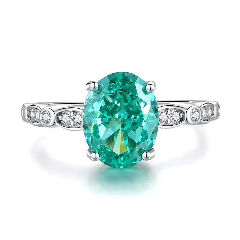 S925 silver geometric ring with emerald stone, Palaibahao inlay, and high carbon diamond accent on ellipse design