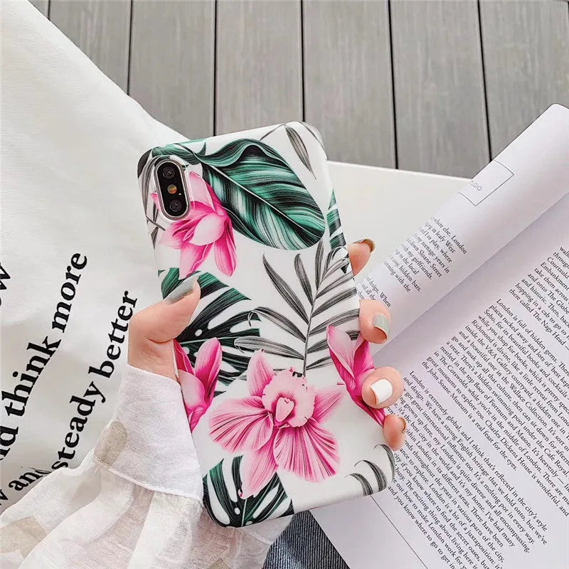 Pink floral pattern TPU back cover case for iPhone on a white background.