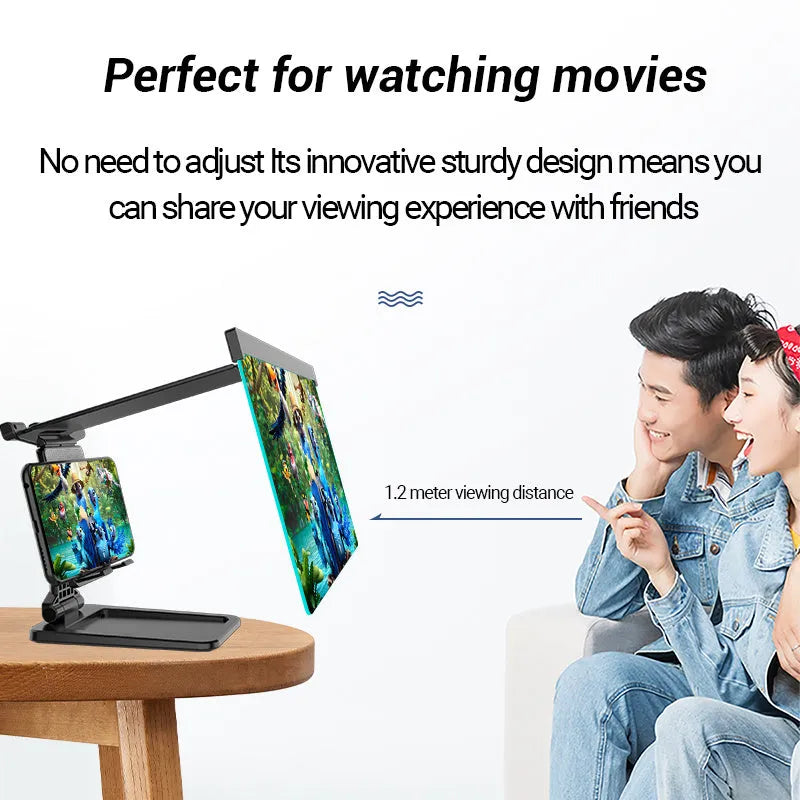 Black folding mobile phone screen amplifier with detachable holder, shown magnifying a smartphone display.