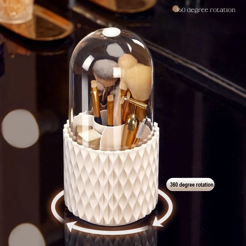 White rotating acrylic makeup brush holder with transparent lid on a desktop