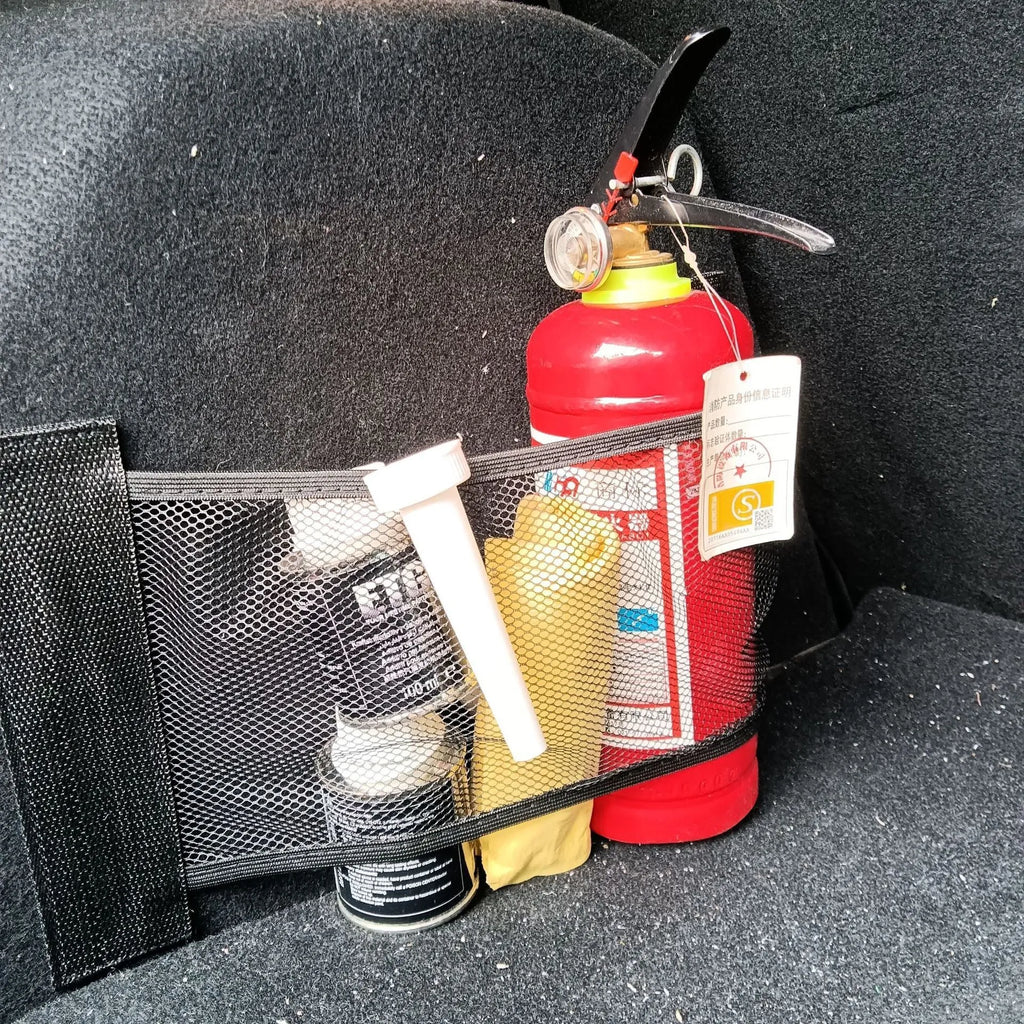 Elastic polyester mesh car boot storage organiser net shown in a vehicle trunk.