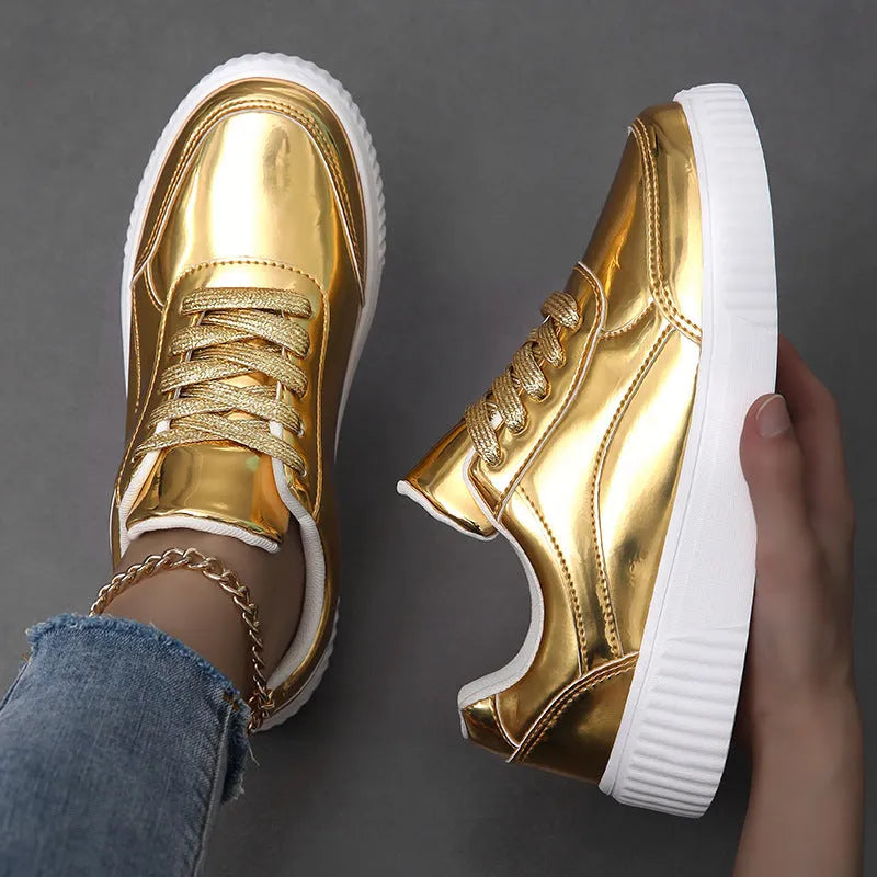 Rose gold and gold sequinned platform sneakers with round toe and thick MD sole.