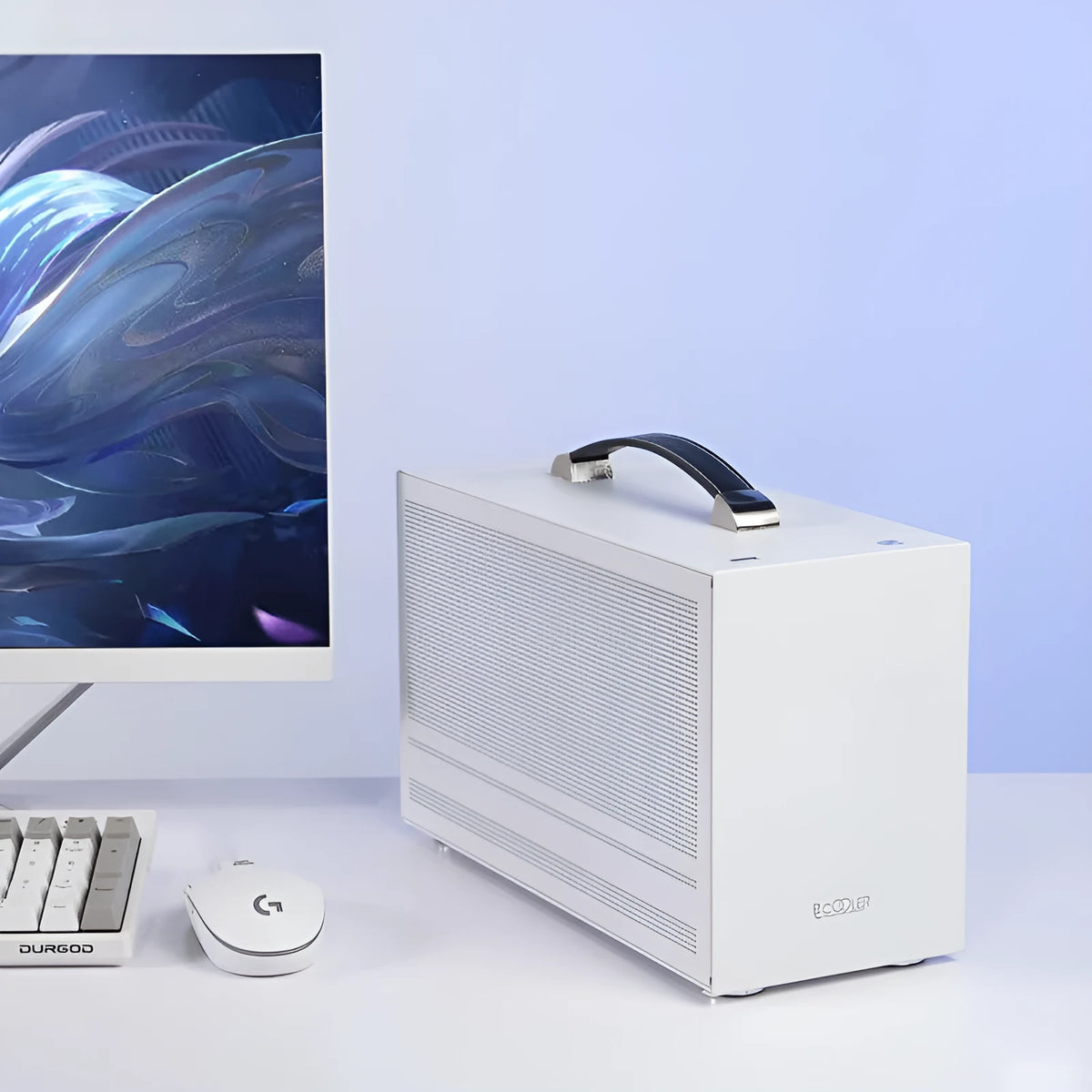 Three Hummingbird PRO portable ITX desktop computer case in titanium grey or white finish.