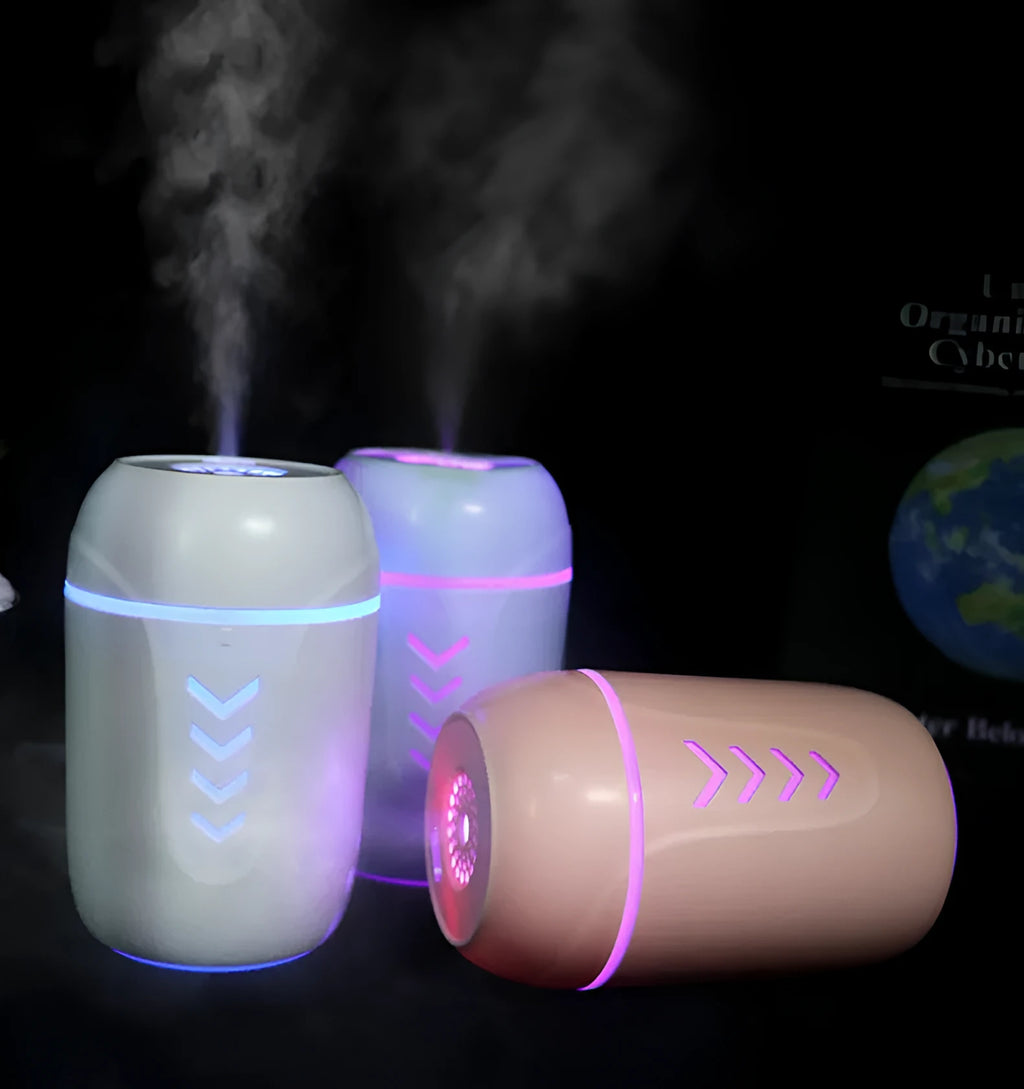 Portable car humidifier with columnar design in blue, pink, and white colour options