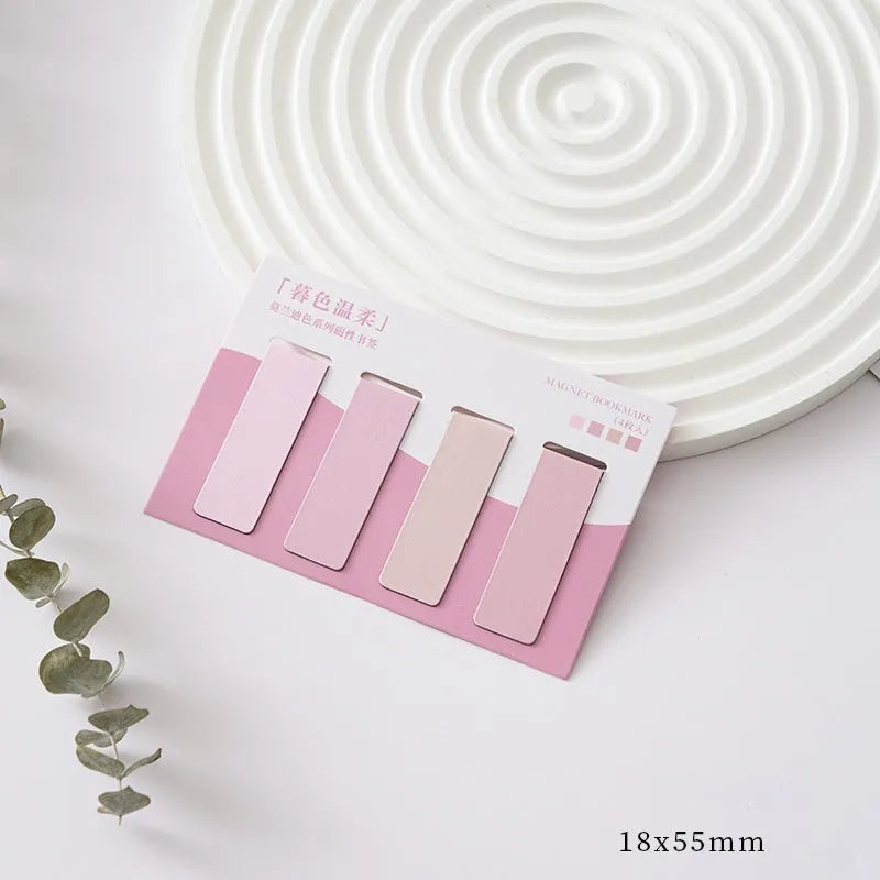 Set of four Morandi colour block magnetic bookmarks in different muted colours.