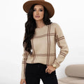 Women's loose-fit plaid sweater with colour-block stripes in acrylic, shown in apricot colour.