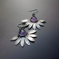 Purple bohemian-style earrings with animal and Zodiac modelling in resin and alloy.