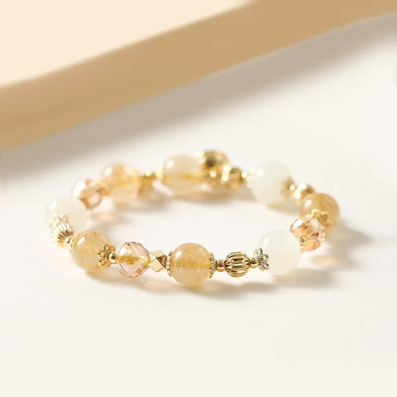 Gold coloured rutilated quartz crystal bracelet with electroplated finish in Korean style.