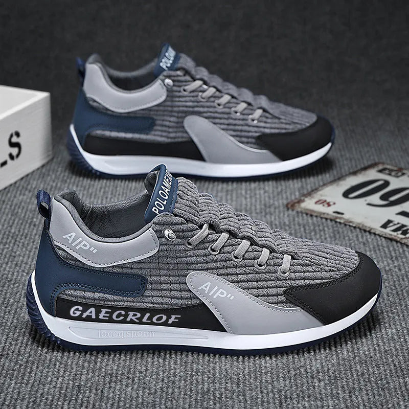 Men's grey and green mesh running shoes with viscose soles and lace-up fastening