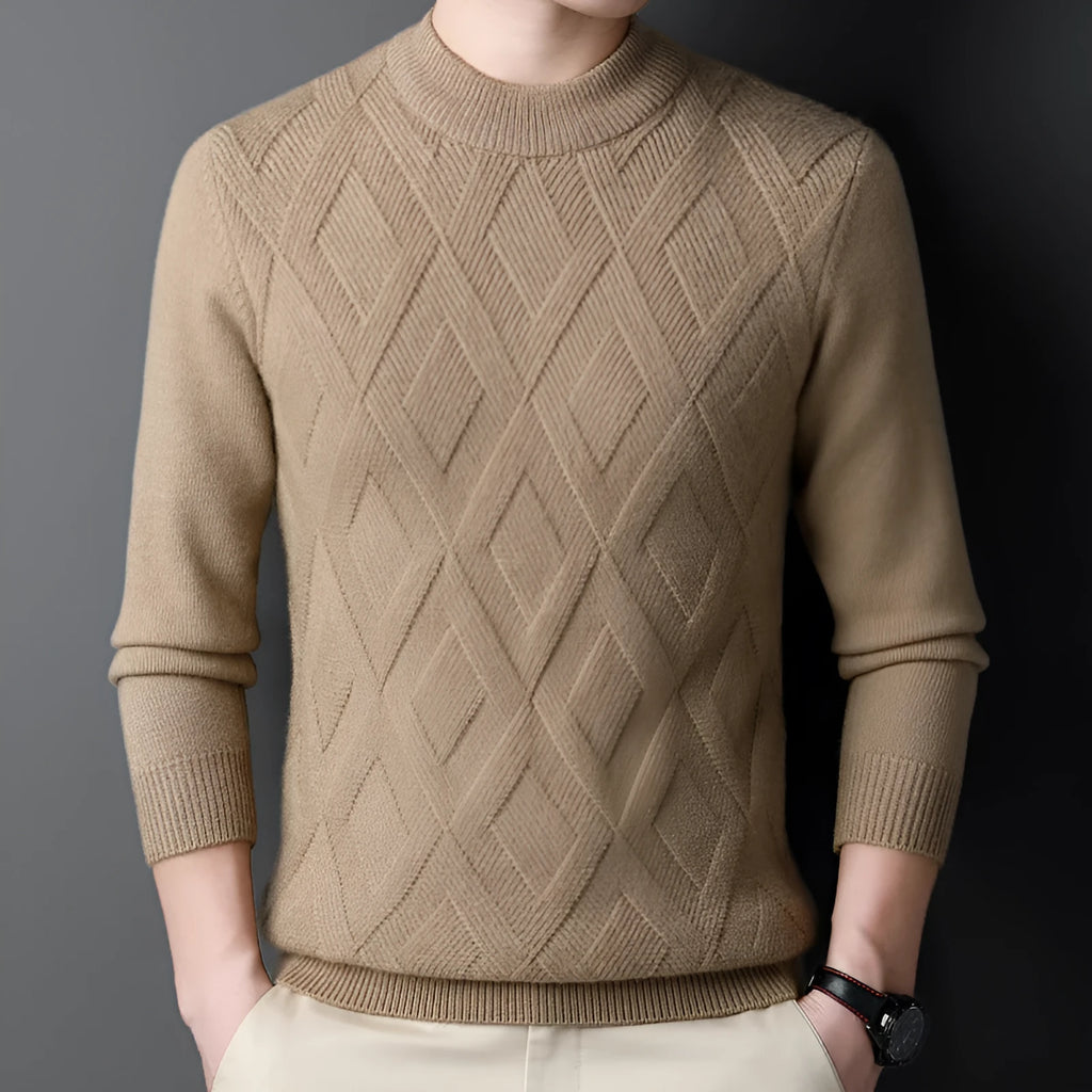Man wearing a thick diamond jacquard pattern wool blend pullover sweater in a neutral colour.