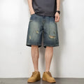 Blue retro denim shorts for men with loose hole design and straight leg cut
