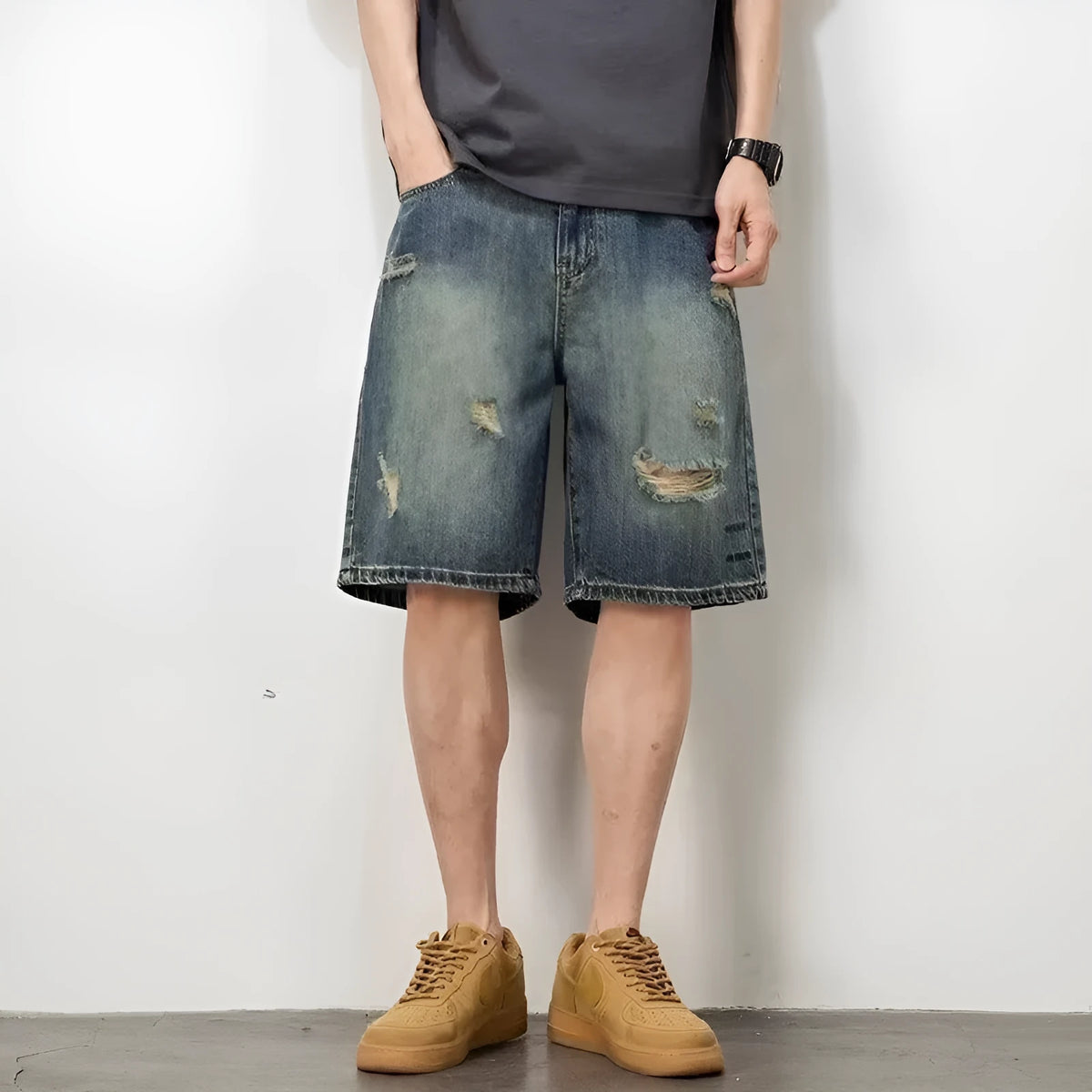 Blue retro denim shorts for men with loose hole design and straight leg cut