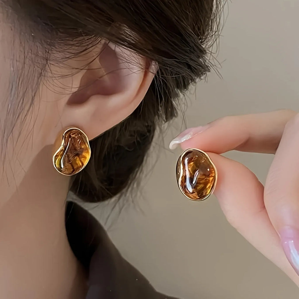Handmade geometric alloy earrings with tassel elements in three colour options