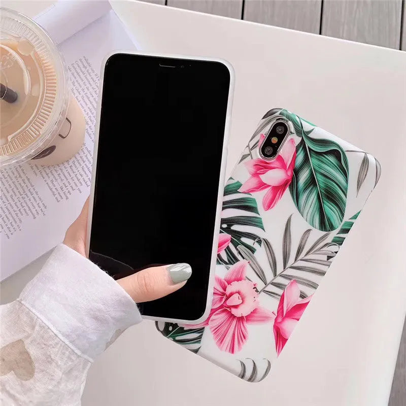 Pink floral pattern TPU back cover case for iPhone on a white background.