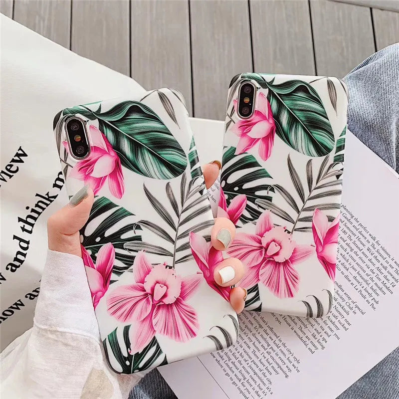 Pink floral pattern TPU back cover case for iPhone on a white background.