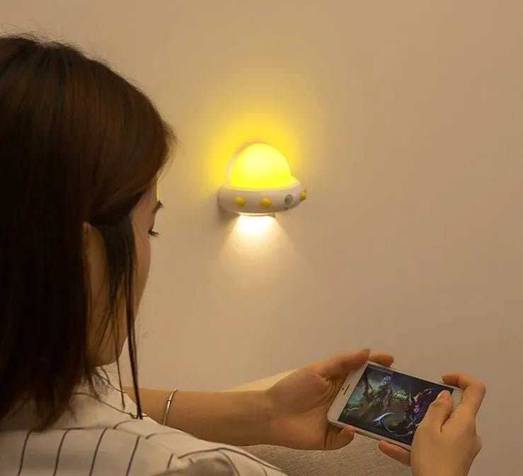 Remote control UFO bedside night light with modern cartoon design