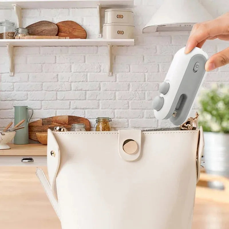Handheld white heat sealer for sealing chip bags with USB Type-C charging port