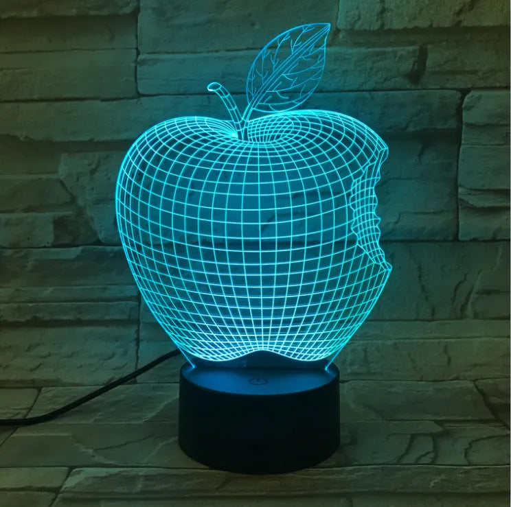 3D fruit-shaped night light with acrylic shade and touch control showing seven colour options