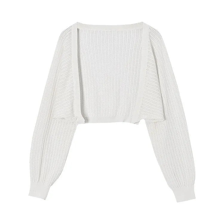 Women's hollow out blouse with long lantern sleeves in a linen blend fabric, shown in apricot colour.