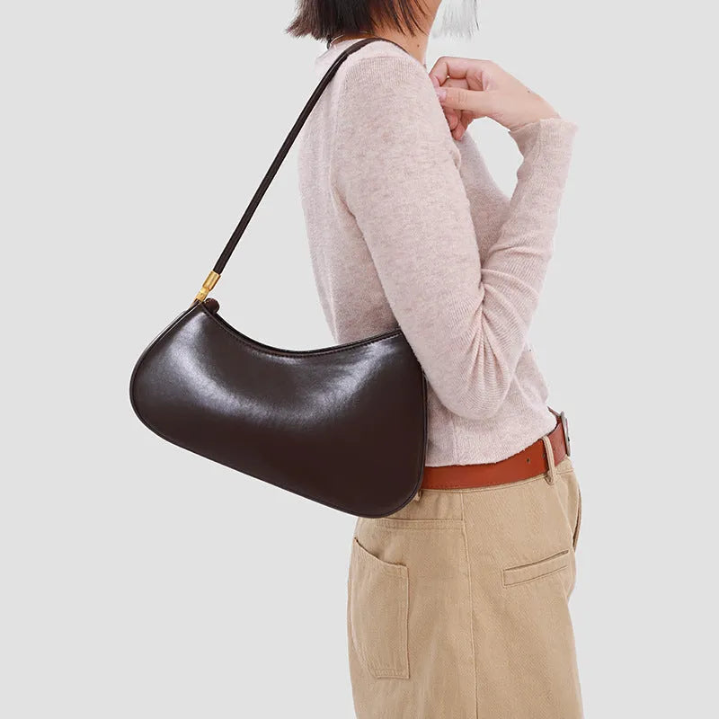 Women's retro oval commuter bag in PU leather with single shoulder strap