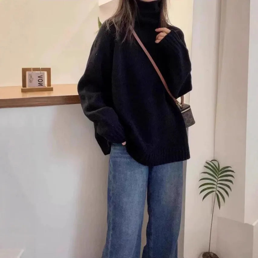 Women's loose fit thick turtleneck sweater with a 3D curling pile collar in red.