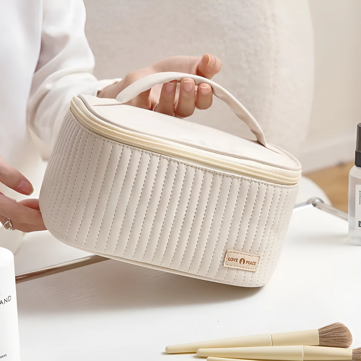 Open-top round cake makeup bag in a choice of six solid colours made from PU leather.