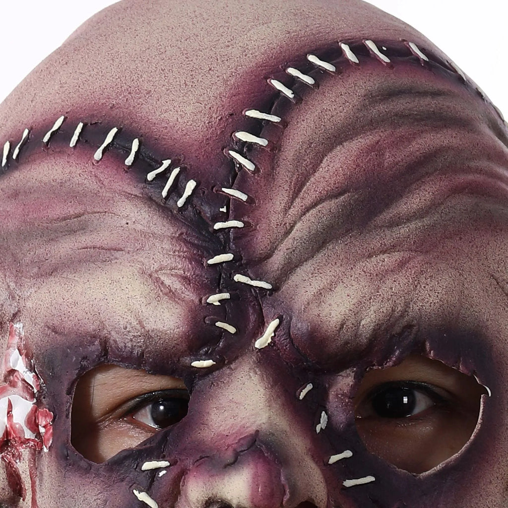 Latex three-sided Grimace horror Halloween mask for adults on a black background.