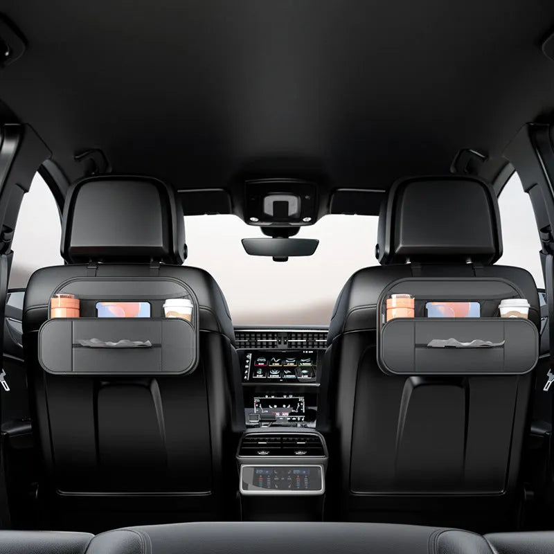 Black leather car seat rear storage bag mounted behind a vehicle seat