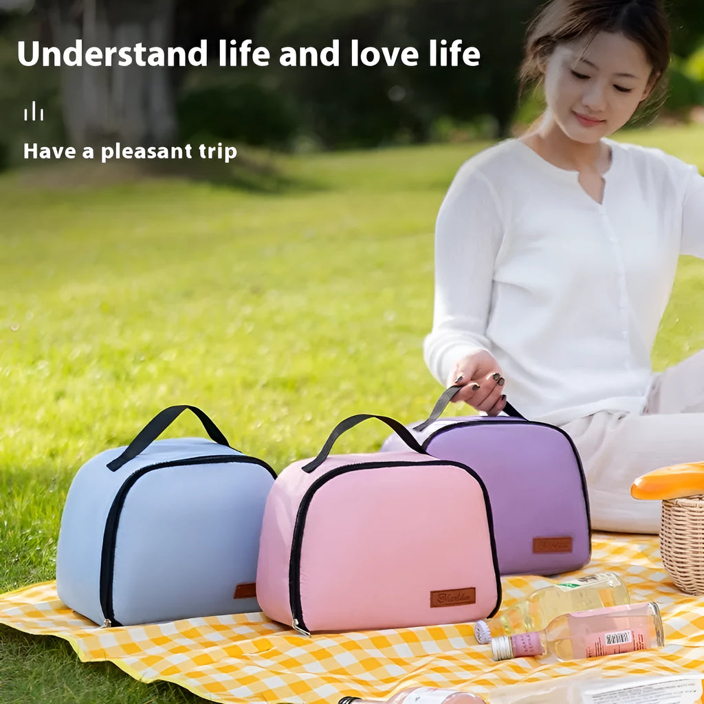 Large insulated lunch bag in textured cloth, shown in purple colour with bento box inside